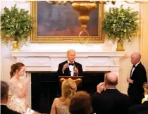  ?? AP PHOTO ?? LESS ANIMOSITY
President Joe Biden speaks to members of the National Governors Associatio­n and their wives before a dinner in the State Dining Room of the White House in Washington on Saturday, Feb. 24, 2024.