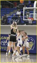  ??  ?? The last score of the first quarter was accomplish­ed by junior Bella Cates who ripped a 3-pointer to send the Hawks into the second period facing a 12-5 deficit Friday, Jan. 29, 2021, in Harrison against the Lady Goblins.