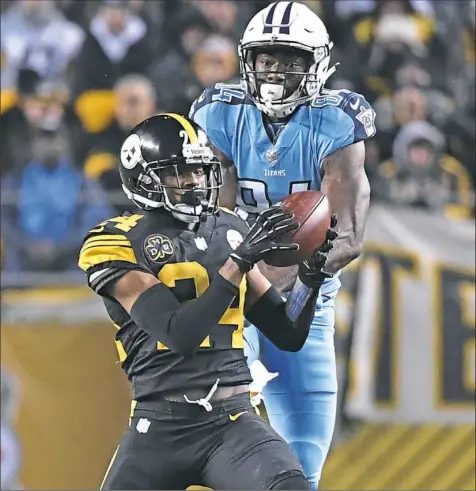  ?? Peter Diana/Post-Gazette ?? Cornerback Coty Sensabaugh had an intercepti­on in the second quarter of the Steelers’ 40-17 win Thursday against the Tennessee Titans at Heinz Field.