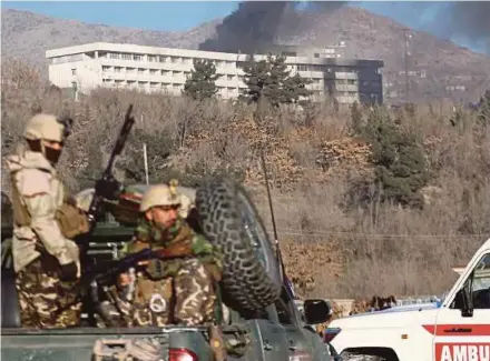  ?? EPA PIC ?? Smoke billowing from the Interconti­nental Hotel after an attack by gunmen in Kabul, Afghanista­n, yesterday.