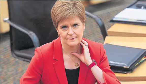  ?? Picture: PA. ?? First Minister Nicola Sturgeon during First Minster’s Questions as the latest Covid statistics were released.