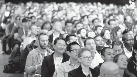  ?? Photograph­s by Eric Risberg Associated Press ?? SOFTWARE DEVELOPERS attending Facebook’s F8 conference — all 2,600 of them — received a Gear VR headset that sells for $99.99.