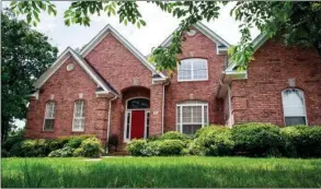  ?? SUBMITTED PHOTOS ?? This all-brick home has four bedrooms, three-and-a-half baths, an of  ce, a bonus room and more. The large, fully fenced backyard has plenty of space for children’s play equipment.