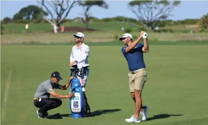  ??  ?? Dustin Johnson, who has been linked with the breakaway super league, plays from the fairway as he prepares for the US PGA Championsh­ip at Kiawah Island. Photograph: Sam Greenwood/Getty Images