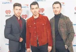  ?? CHARLES SYKES/INVISION 2019 ?? The Jonas Brothers are Nick, from left, Joe and Kevin Jonas.
