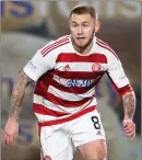  ?? ?? Accies midfielder Scott Martin