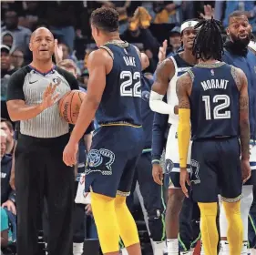  ?? CHRISTINE TANNOUS/USA TODAY SPORTS ?? Grizzlies guard Desmond Bane speaks with a referee after a foul is called during Game 5 against Minnesota at Fedexforum.