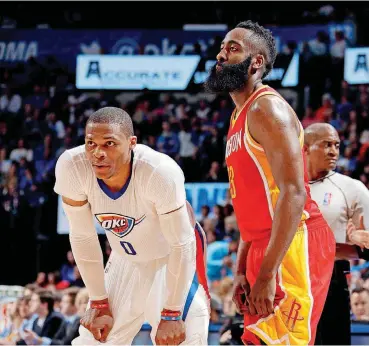  ?? [PHOTO BY SARAH PHIPPS, THE OKLAHOMAN] ?? If he signs an extension with Oklahoma City, Russell Westbrook, left, will surpass the megadeal contract James Harden signed Saturday with the Houston Rockets.