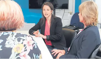  ?? Pictures: Mhairi Edwards. ?? Centre manager Sinead Daly, MSP Mairi Gougeon and Ann Moulds, the founder and chief executive of Action Against Stalking, discuss the bill to help victims of stalking.