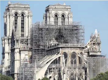  ??  ?? Scaffoldin­g is seen at Notre Dame cathedral in Paris. — Reuters photo