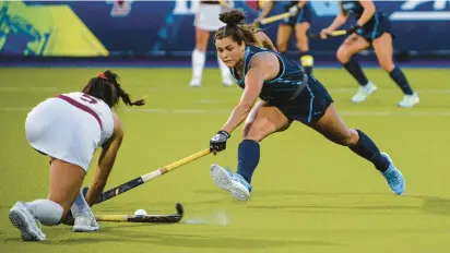  ?? ALLISON F. SMITH ?? The University of North Carolina’s Meredith Sholder fights for the ball against Boston College in an ACC game in 2020.