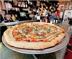  ?? [OKLAHOMAN ARCHIVES PHOTO] ?? Hand-tossed pizza is shown at Empire Slice House at 1734 NW 16 in Oklahoma City.