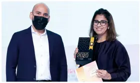  ??  ?? Most Admired E-COMMERCE RETAILER of the Year Hozefa Saylawala (presenter) with Halima Jumani