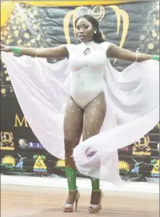  ??  ?? Gabriella Chapman wearing a costume that represents minerals in Guyana. She is called Iridescenc­e.