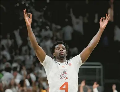  ?? MARTA LAVANDIER/AP ?? Miami guard Bensley Joseph gestures as the team leads Duke during the Hurricanes’ win over the Blue Devils on Monday in Coral Gables. Joseph and the Hurricanes will look to extend their home winning streak to 14 games against Louisville on Saturday.