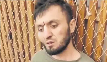  ?? ?? Terrorista. Uno de los atacantes arrestado, sería el checheno Abdl Hakim Shishani o Rustam Azhiyev.