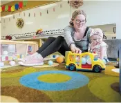  ?? JULIE JOCSAK ST. CATHARINES STANDARD PHOTO ?? Alexis Kovacs plays with her daughter, Kinsley, as part of Strive Niagara’s outreach program.