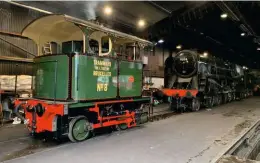  ?? PAUL MIDDLETON ?? Little and large. Newly overhauled Cockerill 0-4-0VBT Works No. 1625 ‘Lucie’ gets steam up inside Grosmont shed alongside ‘9F’ No. 92134.