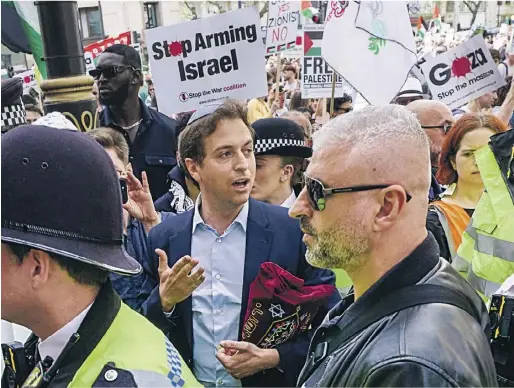  ?? PHOTOGRAPH: TOM BOWLES ?? The CEO of the Campaign Against Antisemiti­sm, Gideon Falter, pictured during a protest against the war in Gaza