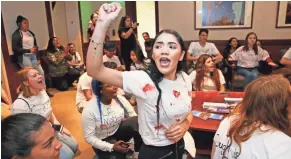  ?? ROB SCHUMACHER/THE REPUBLIC ?? Bianca Ren of Dobson High protests outside Gov. Ducey’s office.