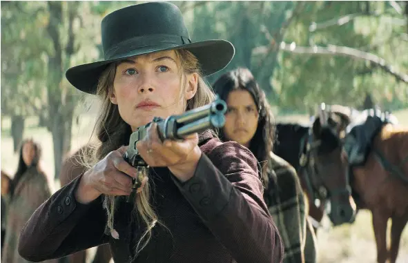  ?? — PHOTOS: ENTERTAINM­ENT STUDIOS ?? Rosamund Pike’s performanc­e in Hostiles is the high point of her career to date. She shines in the role of a shattered woman who lurches between moments of grief and insanity after her family and farmstead are wiped out by Comanches.