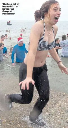  ?? Pictures: STEVE REIGATE/NORTH NEWS ?? ‘Quite a lot of bravado’... a bather at Gosport yesterday