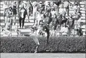  ?? Joe Robbins / Getty Images ?? South Carolina’s Shi Smith makes a 10-yard touchdown catch against Auburn’s Nehemiah Pritchett on Saturday at Williams-brice Stadium in Columbia, S.C.