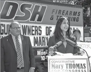  ?? MARK WALLHEISER/THE ASSOCIATED PRESS ?? Mary Thomas, Republican candidate for Florida’s 2nd Congressio­nal District, speaks July 19 at DSH Firearms in Tallahasse­e, Fla. Thomas, who wants to become the first Indian-American woman in Congress, received an endorsemen­t from John Velleco, left,...