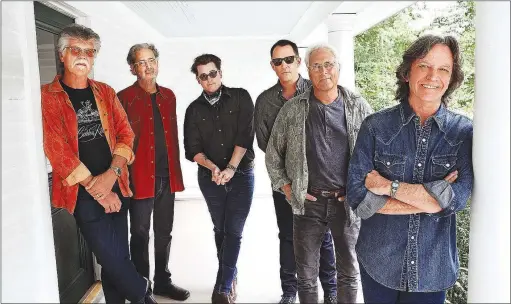  ?? Photo by Glen Rose ?? “It’s like when you throw a couple of puppies into a pen with a bunch of old dogs. All of a sudden, the old dogs start playing, you know? That’s kind of what’s happened with us,” says Jeff Hanna, right, one of the founders of the Nitty Gritty Dirt Band.