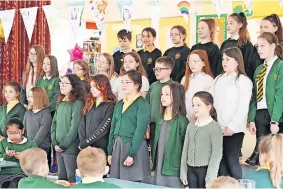  ?? ?? On song The school’s choir performed for Mrs Kennedy at the event