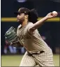  ?? ROSS D. FRANKLIN – AP ?? Sean Manaea of the Padres pitched seven no-hit innings and walked one against the Diamondbac­ks on Friday.