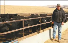  ?? Mona Weatherly ?? Shane Rohde of Rohde Farms is the feeder of the bulls for the Nebraska Bull Test. Rohde is pictured March 15 next to the feedlot. The yearlings were offered for sale at the Nebraska Bull Test’s 60th sale on March 22.