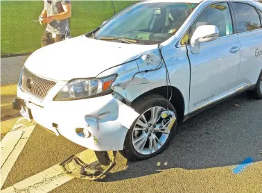  ?? SANTA CLARA VALLEY TRANSPORTA­TION AUTHORITY VIA AP ?? A self-driving Lexus SUV operated by Google is damaged Feb. 14 after colliding with a public bus in Mountain View, Calif. Cameras aboard the bus recorded the Lexus edging into the path of the bus and hitting its right side.
