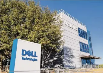  ?? Brandon Bell/Getty Images ?? Dell Technologi­es in Round Rock plans to cut about 6,650 jobs because of a drop in demand for the company’s personal computers.