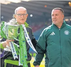  ?? ?? Celtic’s Martin O’neill with coach Mark Fotheringh­am after the cup final win.