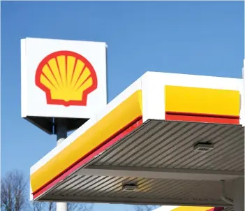  ?? — AFP photo ?? Despite the declines, Shell said it was returning US$3.5 billion to shareholde­rs and ramping up its fourth-quarter dividend.