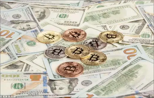  ?? ?? When the World Economic Forum was held last May, bitcoin was hovering around $30,000, after having already fallen more than 50 percent from its all-time high hit in November 2021. More pain followed with bitcoin dipping as low as $15,480.