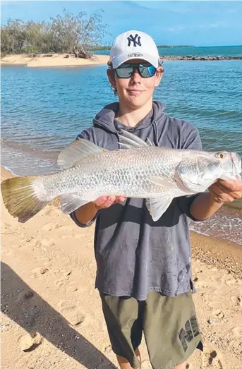  ?? ?? Jack Scott, 16, caught and released this barra while fishing at Magnetic Island's West Point.