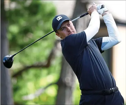  ?? VERN FISHER — STAFF PHOTOGRAPH­ER ?? Jordan Spieth completed 16holes at Spyglass Hill on Friday at 10-under par and shares the lead with four other golfers.