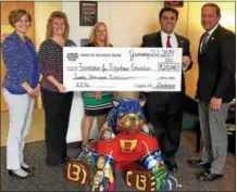  ?? SUBMITTED PHOTO ?? Melissa Woodard, assistant superinten­dent; Tessi Melchior, Foundation executive director; Erin Cohen, Ambler Savings Bank retail officer; Roger Zacharia, president and CEO of Ambler Savings Bank; and Greg Herb, Ambler Savings Bank trustee and...