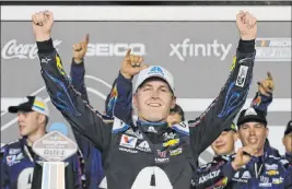  ?? Terry Renna The Associated Press ?? NASCAR driver William Byron celebrates winning the second of two Daytona 500 qualifying races on Feb. 13. Byron, 22, won an ENASCAR race at Bristol, Tenn., on Sunday.