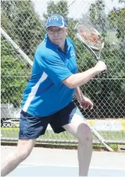  ??  ?? Ray Throup lines up a backhand return during the Riverside tennis match between Neerim District and Trafalgar.