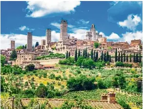  ??  ?? Step back in time when you are in the medieval town of San Gimignano.