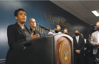  ?? Megan Varner / Getty Images ?? “It is unacceptab­le, it is hateful and it has to stop,” says Atlanta Mayor Keisha Lance Bottoms at a press conference about the fatal shootings Tuesday of eight people at three Atlantaare­a spas.