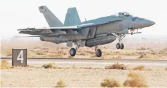  ??  ?? This file photo shows a US Navy F-18 Super Hornet from Naval Air Station Oceana,Virginia Beach, VA, taking off for a training mission during the 2010 Falcon Air Meet at Muwaffaq Salti Air Base, Azraq, Jordan. — AFP photos