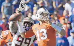  ?? JOHN RAOUX/AP ?? Florida quarterbac­k Feleipe Franks (13) was benched three times in 2017 for poor decision-making and this year will have to learn a new offense.