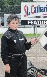  ?? MERRITTVIL­LE SPEEDWAY ?? Chris Crowe of St. Catharines celebrates his first victory of the karting season at Merrittvil­le Speedway.