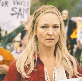  ??  ?? Kari Matchett as Ruby Howard at a peace march in Ladner, B.C.,
protesting the Vietnam War.