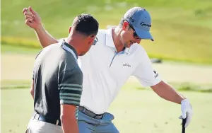  ?? Picture: Getty Images. ?? Justin Rose does some final checks with swing coach Sean Foley during yesterday’s practice round at Erin Hills.