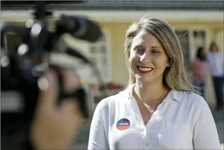  ?? MARCIO JOSE SANCHEZ — THE ASSOCIATED PRESS FILE ?? Katie Hill, then a Democratic Party candidate from California’s 25th Congressio­nal district, talks to a reporter after voting in her hometown of Agua Dulce, Calif.